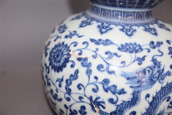 A Chinese blue and white dragon and phoenix double gourd vase , Qianlong mark but late 19th/early 20th century, H. 35.cm